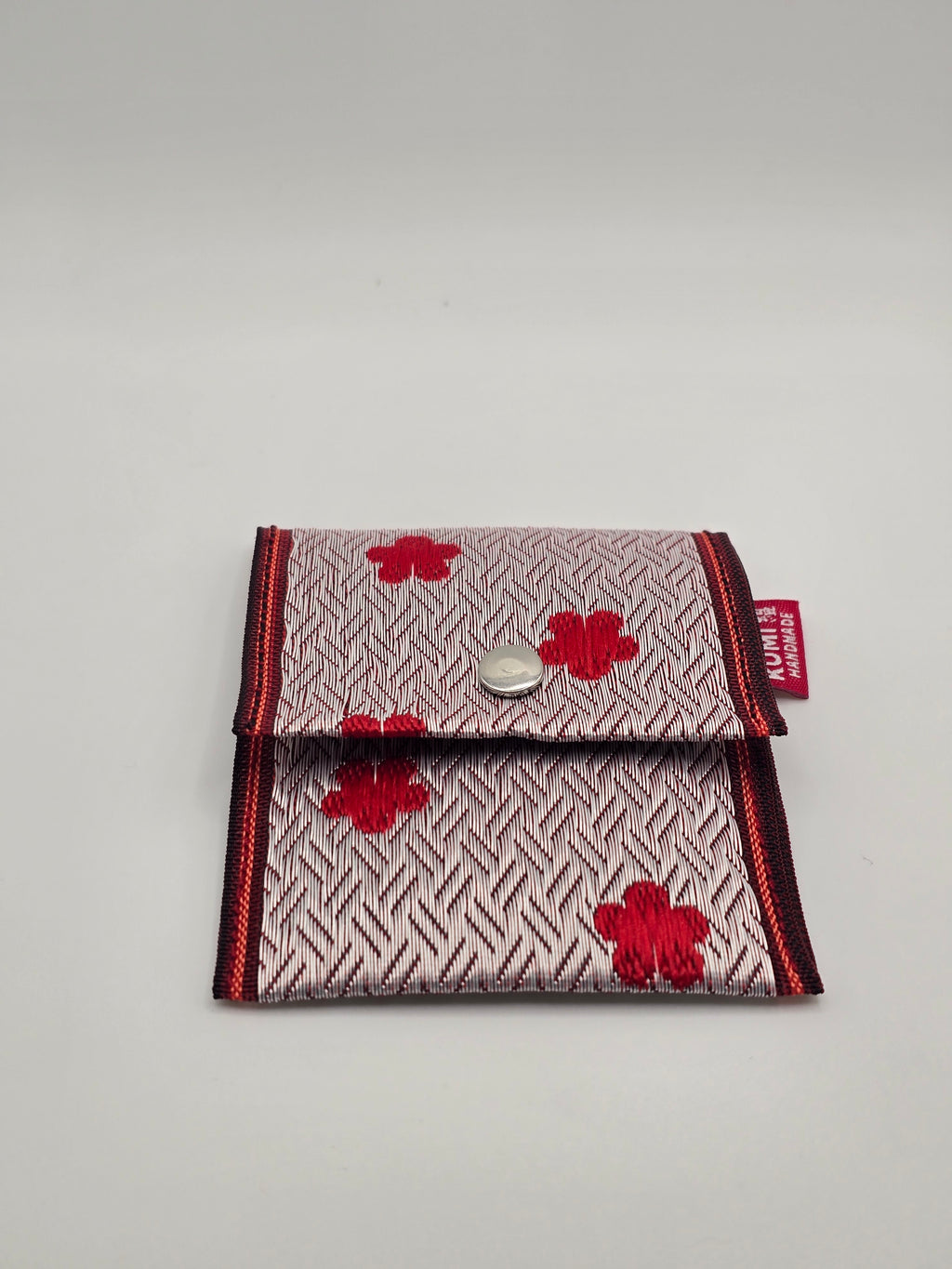 Hana kaori rojo sobre rosa